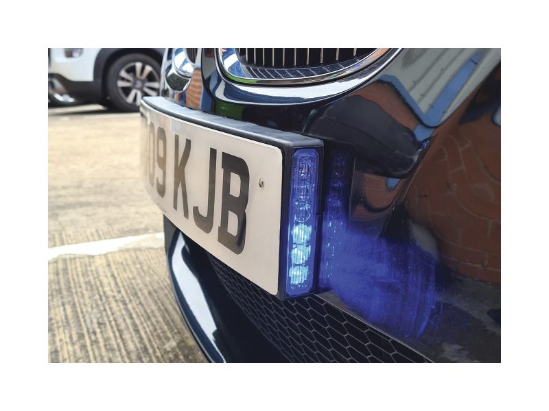 Stealth Reg Plate On Vehicle Shown from the Side 3 Blue LEDs are Lit