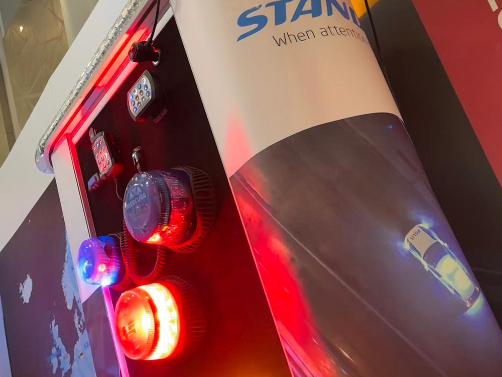 Close up angle view of a display pod on an exhibition stand with various lit up light modules.