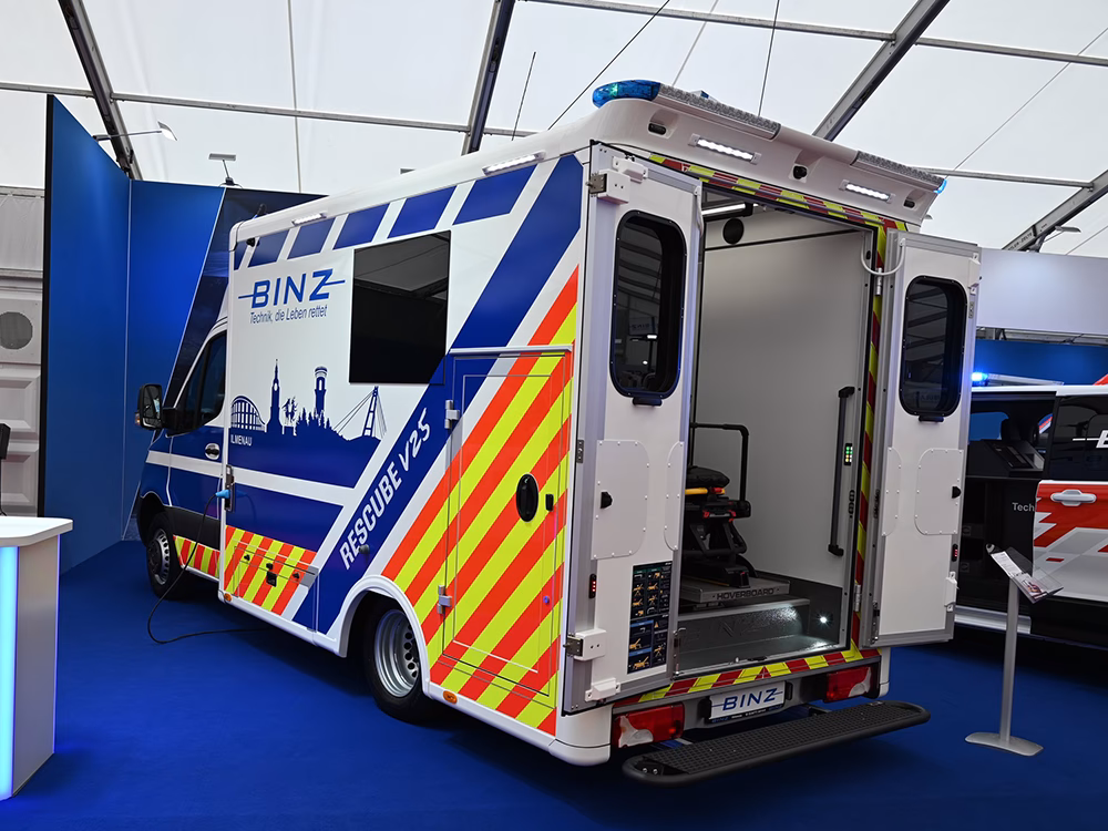 BINZ box ambulance with W3 lightbar on top above back doors.