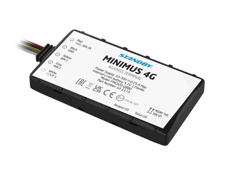 FleetMotus Minimus 4G device angle view, lying down with multicoloured wires extending from the side