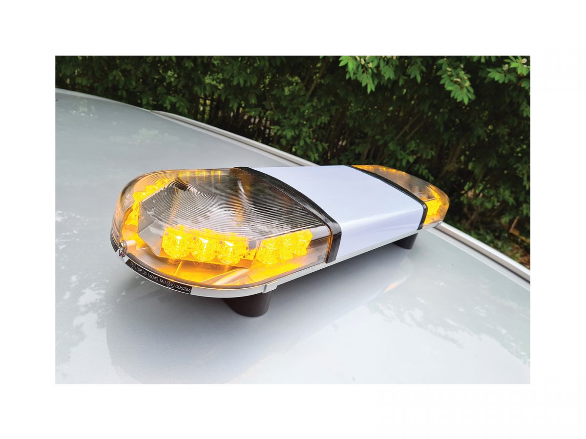 Hurricane PA Lightbar with 60 Watt Speaker Driver In Situ Angle View Lit No Livery on Roof of Silver Car