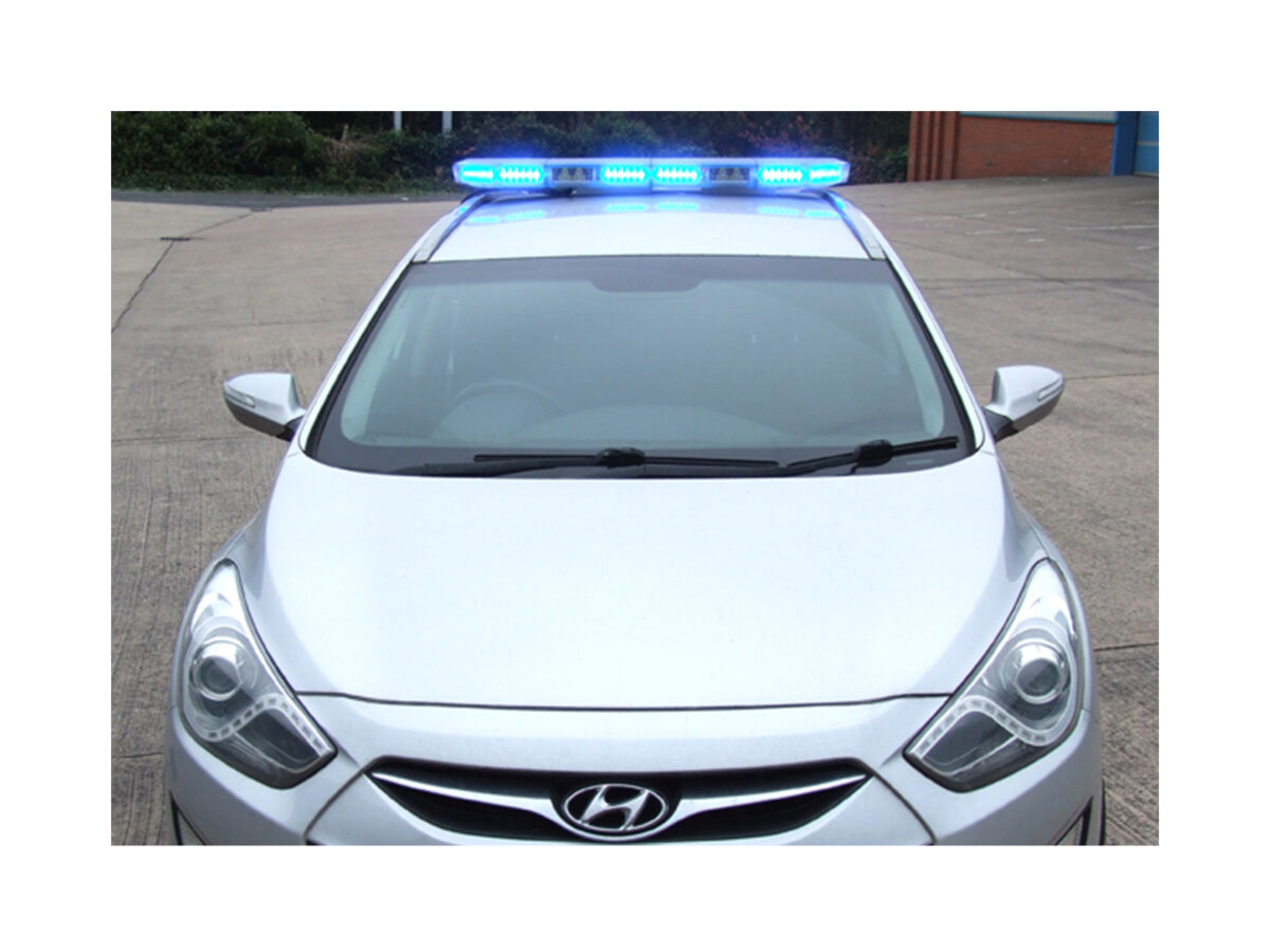 Aegis LED Lightbar In Situ Lit Blue on top of Silver Car Roof Front View