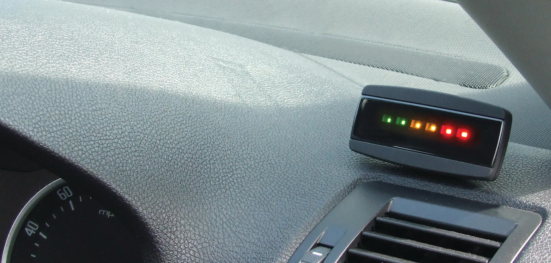 Europa Driver Feedback LED Device with Green, Amber and Red LEDs on a Car Dashboard