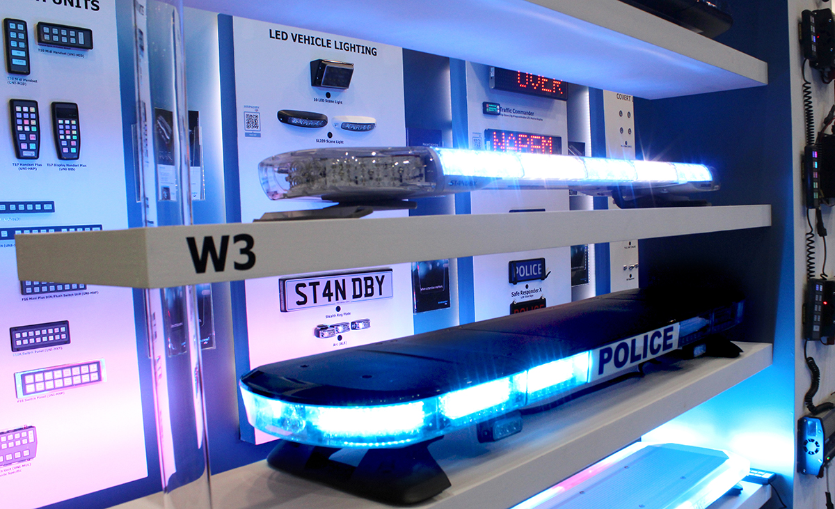 Standby NAPFM stand LED lightbars lit blue with 'W3' label on shelf and Police livery on lightbar below