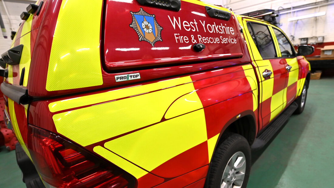 West Yorkshire Fire Vehicle with AEX Equipment. Rear side angle view taken in a workshop.