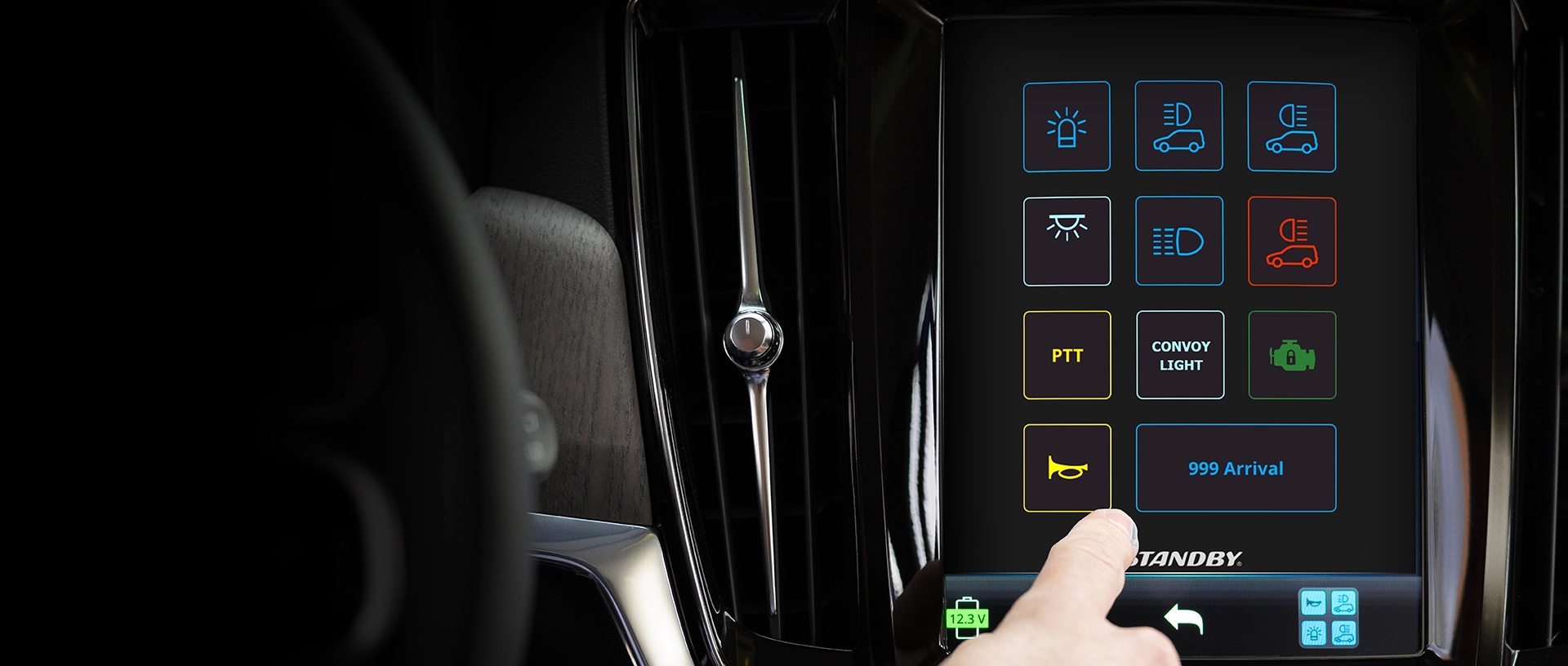 CARAT interface shown on a Volvo infotainment screen taken from behind the wheel as a user touches the screen.