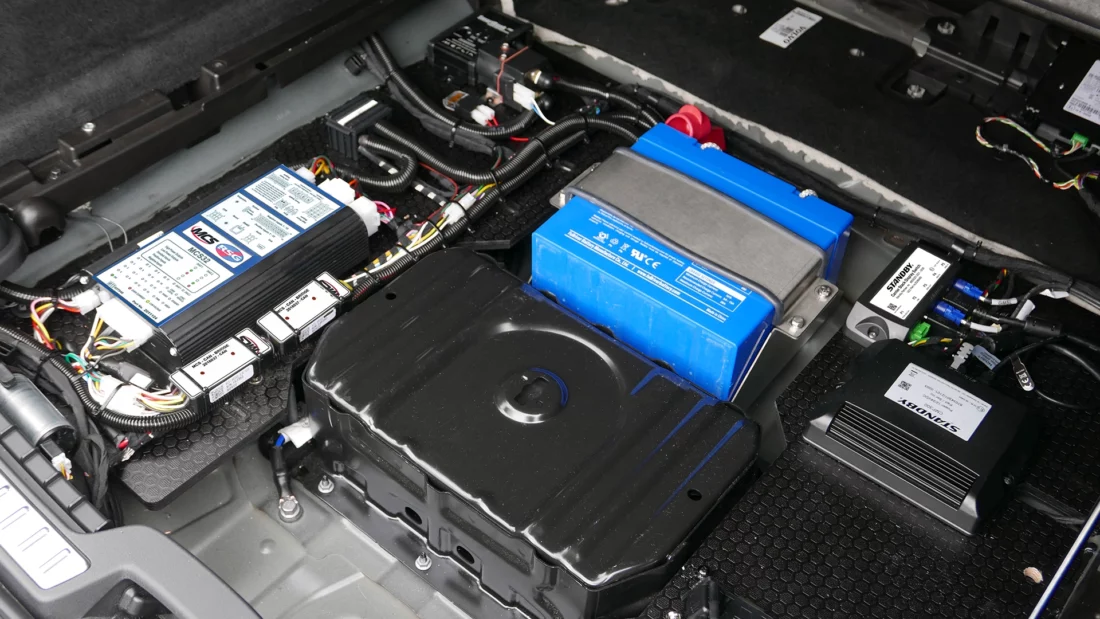 Electrical installation, close up angle view with neat wiring in the back of a Volvo.