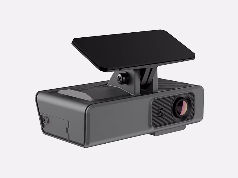 Angle Shot of the Mini Dashcam isolated on a plain light grey background