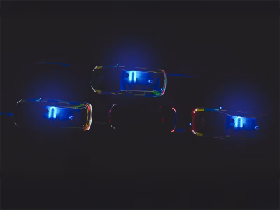 Dark drone shot above 3 Police vehicles demonstrating the Standby UK Sync & Breathe MCS-NX function whilst T-packing a passenger vehicle. Their lightbars are in sync.