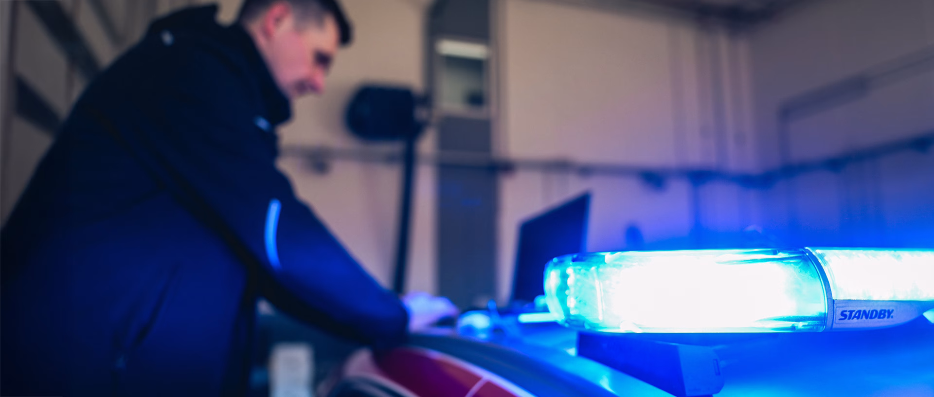 Engineer works on Standby W3 Lightbar on top of a vehicle roof ®BEN OTT