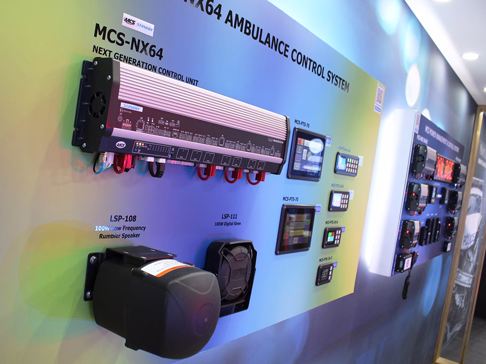 MCS-NX64 Ambulance Control System panel and MCS Power Management and Control Systems panel on the Standby stand at NAPFM 2026.