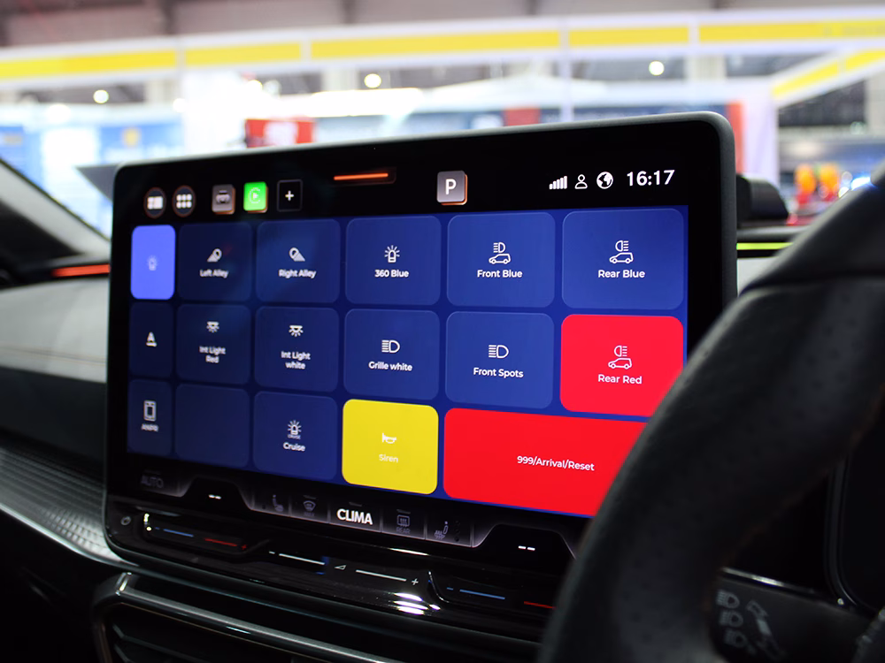 Close up shot of the UniScreen interface on the OEM infotainement screen of a South Wales Police Cupra Leon Estate RPU converted by Elite Solutions at NAPFM 2026.